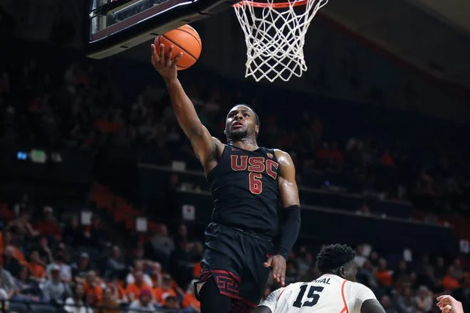 Brony James scores two of his 15 points in Saturday's game at Oregon State.