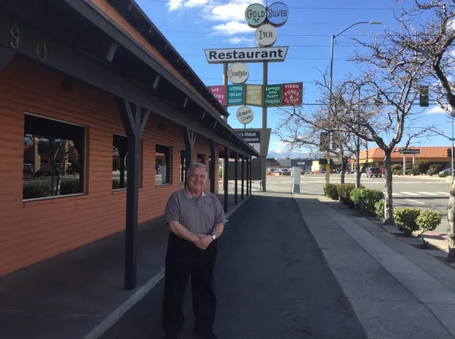 Jeffry Paine stands outside the Gold 'N Silver Inn.