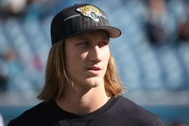 Trevor Lawrence #16 of the Jacksonville Jaguars looks on before a game against the Carolina Panthers at EverBank Stadium on December 31, 2023 in Jacksonville, Florida.