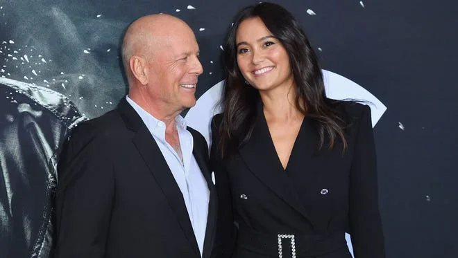 Bruce Willis and his wife Emma Heming Willis at the premiere of his 2019 film "Glass" At New York.